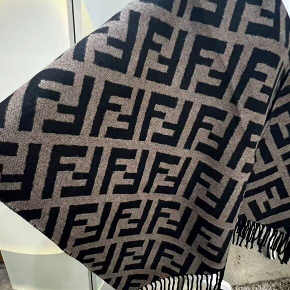 This is a Fendi shawl featuring the brand's iconic FF pattern. - Picture 3 of 8